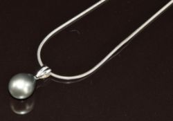 A 14k white gold pendant set with a Tahitian pearl (1.6g) on an 18ct white gold snake chain, 5.6g,