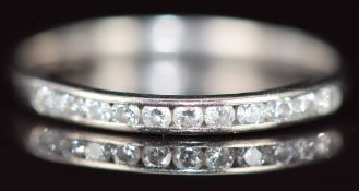 A 9ct white gold eternity ring set with diamonds, 1.3g, size L