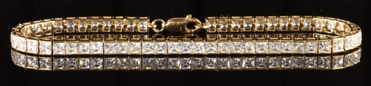 A 9k gold tennis bracelet set with cubic zirconia, 10.8g, 19cm