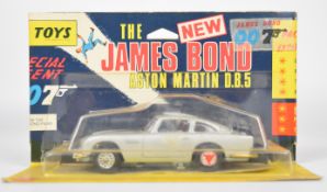 Corgi Toys diecast model James Bond 007 Aston Martin DB5 with silver body, red interior, opening