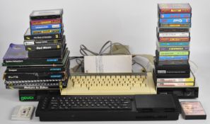 A collection of retro computing items to include BBC Microcomputers, Spectrum QL Acorn Electron,