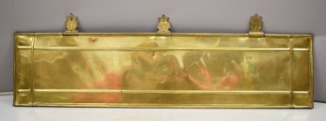 Brass panel with hinged suspension loops, possibly to suit fireplace, 30 x121cm