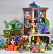 A collection of Teenage Mutant Hero Turtles, The Real Ghostbusters and similar era action figures