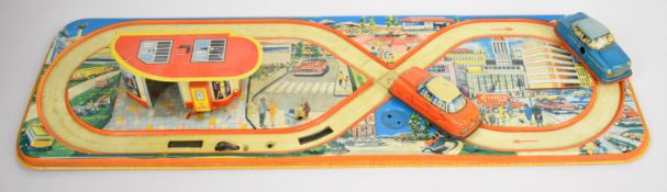 Technofix clockwork tinplate Quick Service Filling Station with two cars and key, 299, made in