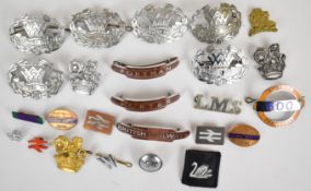 Small collection of metal railway badges including British Rail, Porter, Foreman, GWR and Western