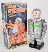 Battery operated plastic bodied 'Lunar Spaceman' robot by Mego, height 30cm, in original box.