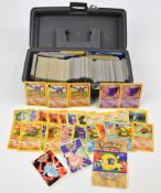 Approximately 700 Pokémon cards from Base, Jungle, Fossil, Base 2 and Rocket sets together with a