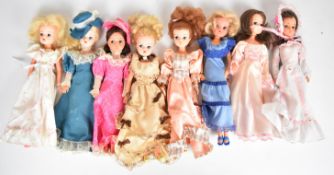 Eight vintage Sindy dolls by Pedigree dressed in Southern Belle and similar clothing.