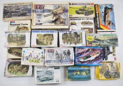 Twenty-three mostly World War 2 themed plastic model kits, manufacturers include Monogram, Dragon,