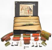 Bing tinplate Miniature Toy Railway comprising six carriages, tender, two platforms, tunnel, signals