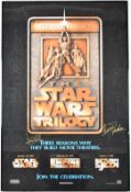 The Star Wars Trilogy (1997) film poster signed by cast members Mark Hamill and Carrie Fisher with