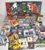 A collection of Citadel Games Workshop Warhammer 40K and similar figurines, rulebooks and