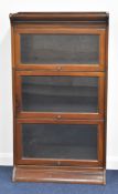 Gumm Globe Wernicke style three section stacking bookcase with glazed up and over doors, W66 x D31 x