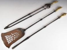 19thC set of fire irons with figural brass handles of nude ladies, length 74cm