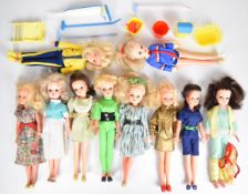 Ten vintage Sindy dolls by Pedigree dressed in 1980's outfits to include Jogger, High Energy,