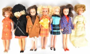 Seven vintage Sindy dolls by Pedigree in original 1960's outfits to include Summery Days, Coffee