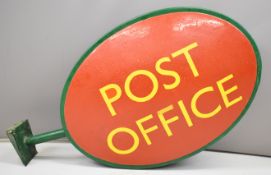 Retro fibreglass oval double sided Post Office advertising sign, overall length from wall bracket