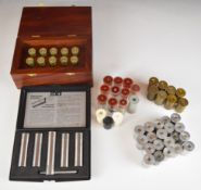 A collection of shotgun and shooting parts and accessories including a wooden case set of butt