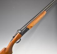 SKB 500 12 bore over and under ejector shotgun with engraved scenes of birds to the locks and