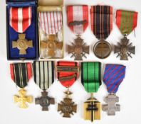 Ten French WW2 era medals including Free French Forces Medal, Order of Liberation Cross,
