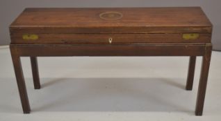 A 19thC mahogany and brass muzzle loading gun case raised on period stand, 79 x 25 x 43cm