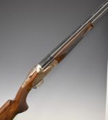 Caesar Guerini Magnus Deluxe Game 12 bore over and under ejector shotgun with engraved scenes of