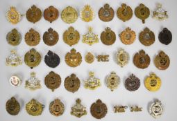 Collection of approximately 40 Royal Engineers cap badges including officer's silvered and gilt,