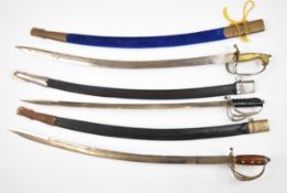 Three made in India tourist swords, longest blade 72cm. PLEASE NOTE ALL BLADED ITEMS ARE SUBJECT