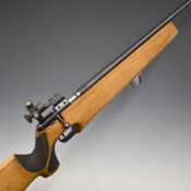 Companhia .22 bolt-action target rifle with textured semi-pistol grip, raised cheek piece, sling