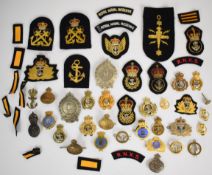 Collection of approximately 40 Royal Navy bullion and cloth and metal badges including Royal Navy
