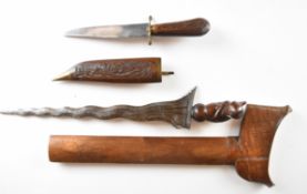 Malaysian Kris dagger with wooden grip, wavy edged 32cm blade and scabbard, together with a modern