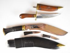 Kukri knife scabbard and an oriental dagger with decorative scabbard. PLEASE NOTE ALL BLADED ITEMS