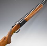 Miroku 12 bore over and under ejector shotgun with engraved locks, chequered semi-pistol grip and