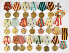 Collection of twenty Russian medals including Liberation of Belgrade, Defence of Leningrad,