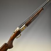 Browning B525 Ultimate 12 bore over and under ejector shotgun with gold engraving of birds