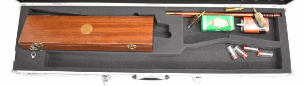 Shotgun or rifle hard carry or flight case with code locks, together with a T E Wood & Son