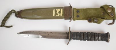 American WW2 fighting knife with leather grip, 16.5cm double edged blade and scabbard stamped US