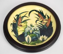 Moorcroft framed plaque with decoration of bullrushes and water lilies, signed and dated verso,