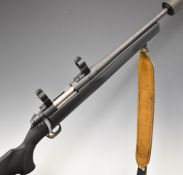 Mossberg 100 ATR .243 bolt-action rifle with textured semi-pistol grip and forend and raised cheek