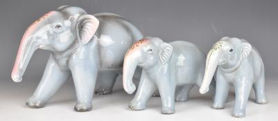 Three Indian Gwalior pottery elephant figures, tallest 19cm