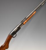 Browning .22 pump-action rifle with semi-pistol grip, adjustable sights and 21.5 inch barrel,