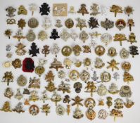 Large collection of approximately 100 British Army cap badges including Lancashire Fusiliers,