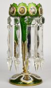 Victorian overlaid glass lustre vase with floral and gilt decoration over a green ground and clear