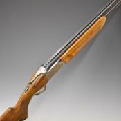 SKB 500 12 bore over and under ejector shotgun with engraved locks, underside, trigger guard and