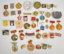 Approximately forty Russia badges including some CCCP examples