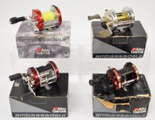 Four Abu Ambassadeur multiplier fishing reels comprising 6600SSC3, 6500C3 two speed, 6500C3 CT Mag