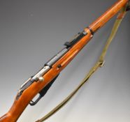 Russian Mosin-Nagant 7.62mm bolt-action rifle with adjustable sights, breech stamped with arrow in