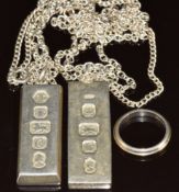 Two silver ingot pendants on chains and a silver ring, 75g