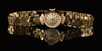 Rotary 9ct gold ladies wristwatch with gold hands and hour markers, silver dial and 21 jewel