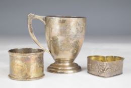 Hallmarked silver christening mug, hallmarked silver napkin ring and a heart shaped trinket box